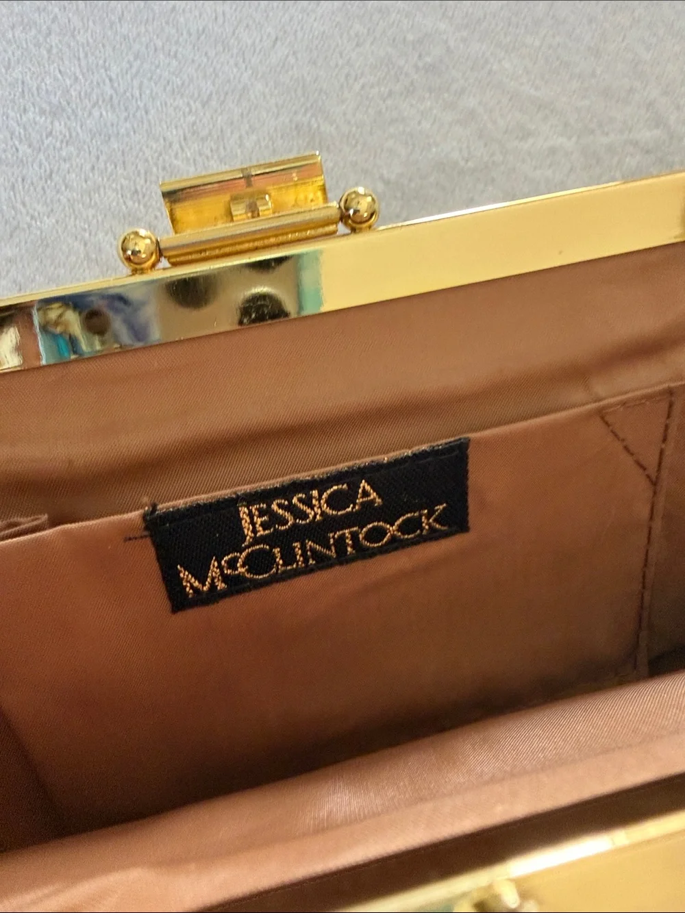 Jessica McClintock Metallic Gold Pleated Frame Clutch